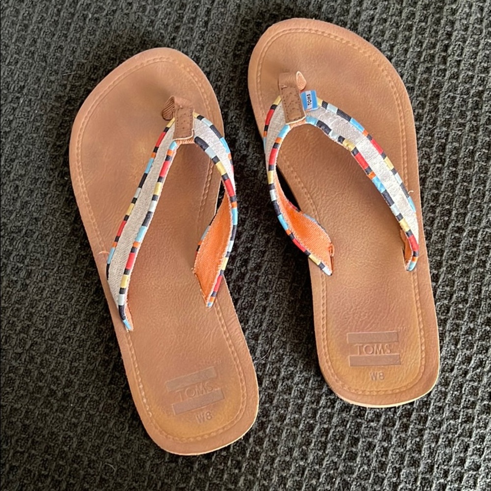 Toms flip flops; gently worn; size 8